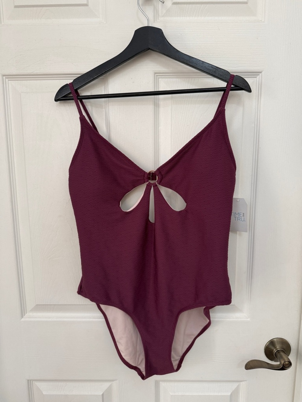 Time & Tru women’s purple one piece bathing suit it’s cut outs